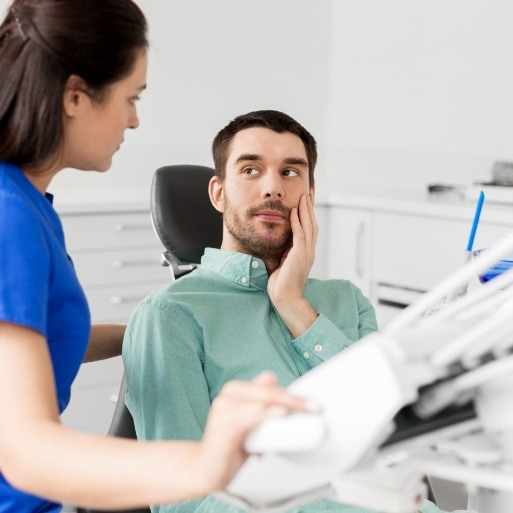 Man in pain before dental treatment