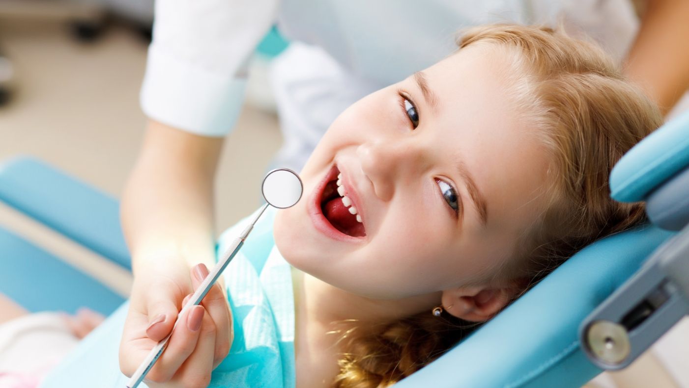 Young patient receiving children's dentistry treatment