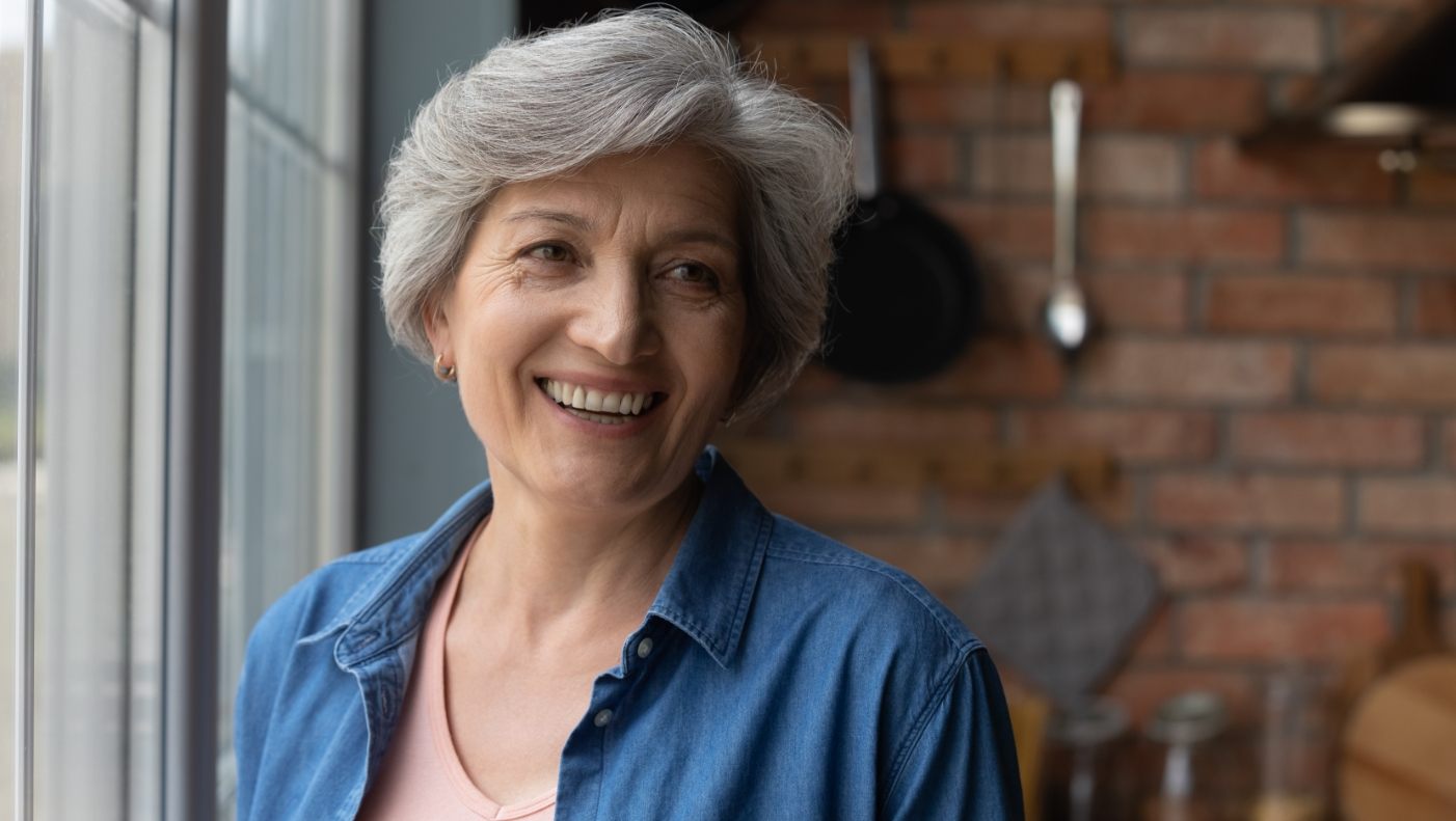 Woman with dentures smiling