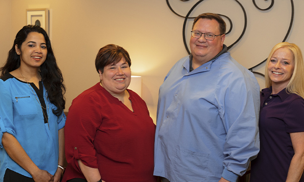 Doctor Labonsky and four members of his State College Pennsylvania dental team