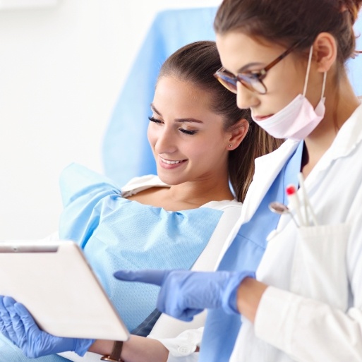 Dentist and dental patient discussing root canal therapy