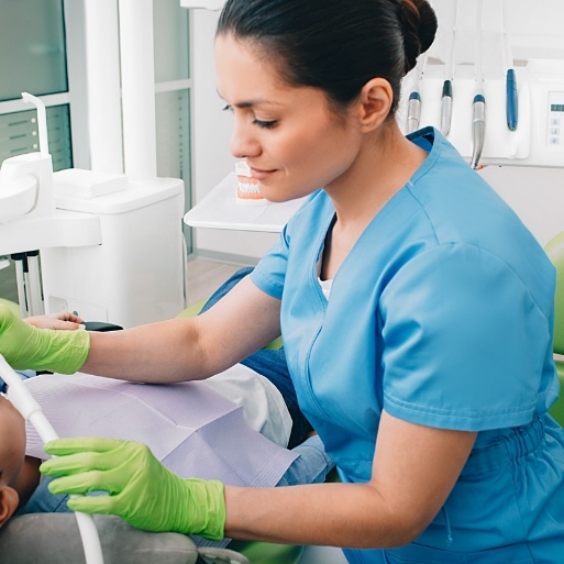 Dentist receiving dental treatment under oral conscious dental sedation